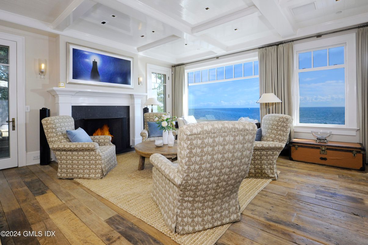 Fireplace, Interior, Living room, Recessed Lighting, Water, Wood Texture Flooring