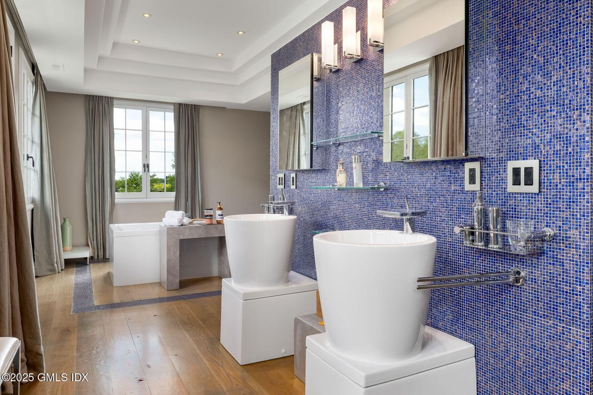 Bathroom, Dual Sink Vanities, Free Standing Baths, Interior, Recessed Lighting, Wood Texture Flooring