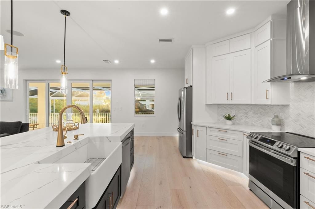 Dining room, Interior, Kitchen, Living room, Pendant Lights, Recessed Lighting, Wood Texture Flooring