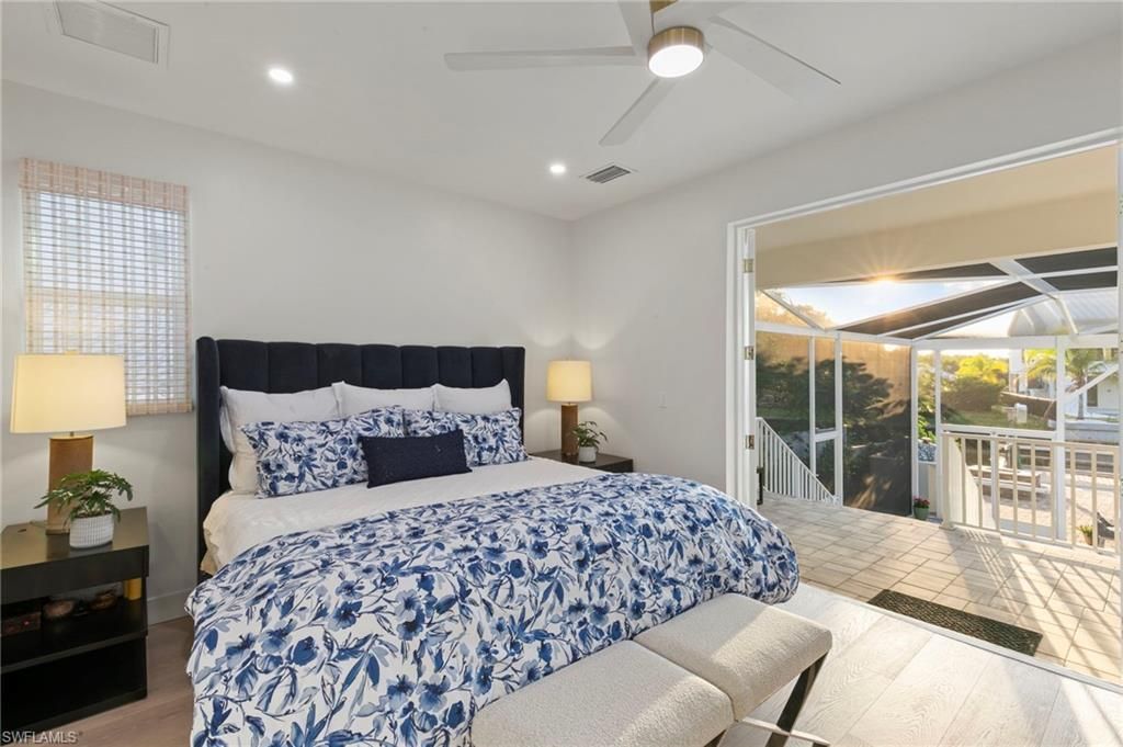 Bathroom, Chandelier, Dual Sink Vanities, Free Standing Baths, Interior, Wood Texture Flooring