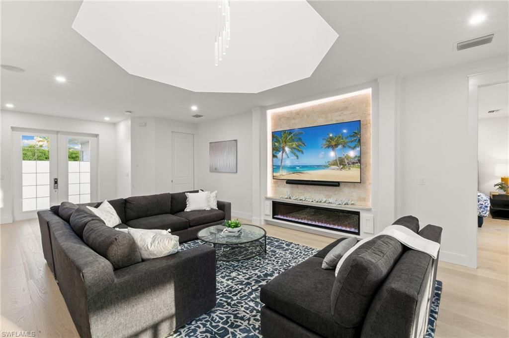 Interior, Kitchen, Marble Walls, Pendant Lights, Recessed Lighting, Stainless Steel Appliances, Wood Texture Flooring