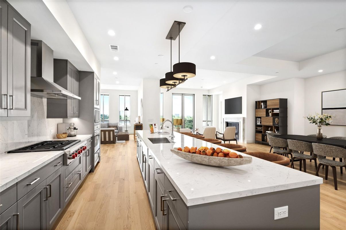 Dining room, Fireplace, Interior, Kitchen, Pendant Lights, Recessed Lighting, Stainless Steel Appliances, Wood Texture Flooring