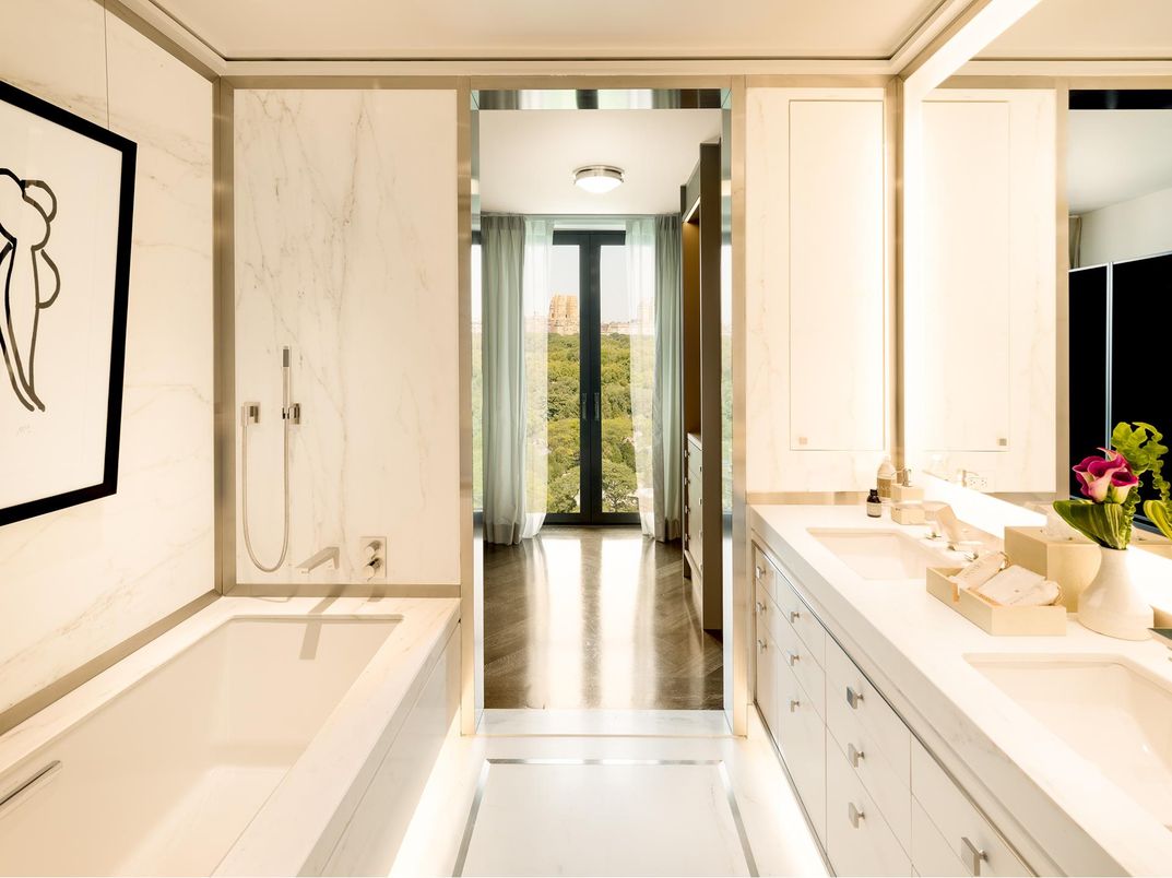 Bathroom, Dual Sink Vanities, Interior, Marble Walls, Wood Texture Flooring