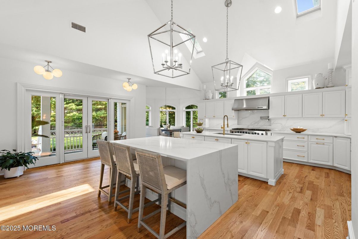 Interior, Kitchen, Marble Walls, Pendant Lights, Recessed Lighting, Wood Texture Flooring