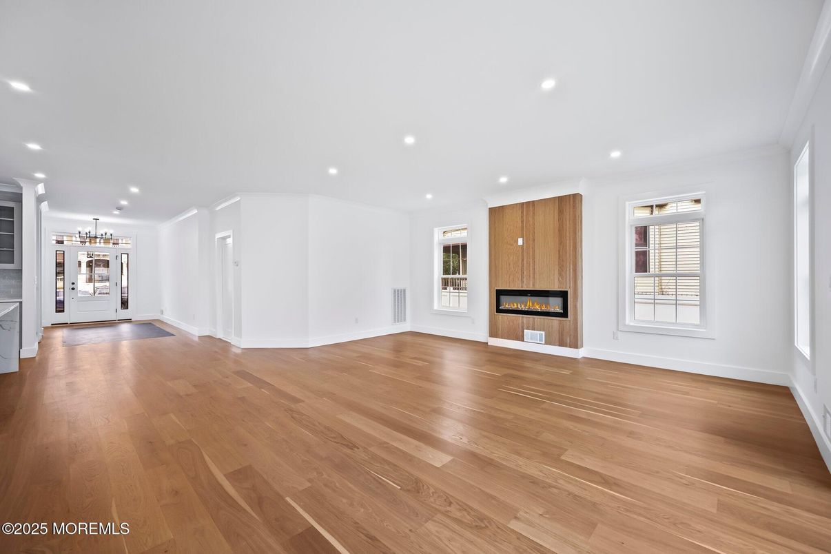 Empty room, Fireplace, Interior, Pendant Lights, Recessed Lighting, Wood Texture Flooring