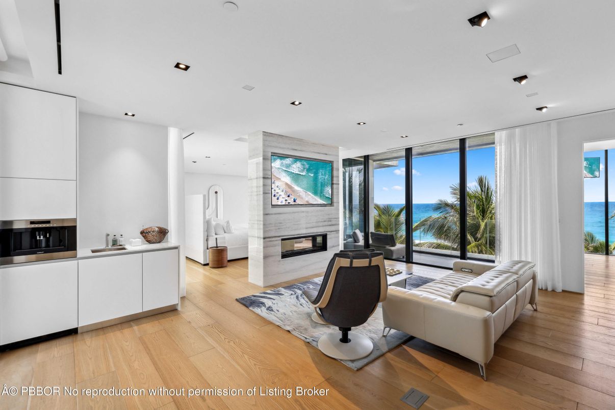 Fireplace, Interior, Living room, Recessed Lighting, Water, Wood Texture Flooring