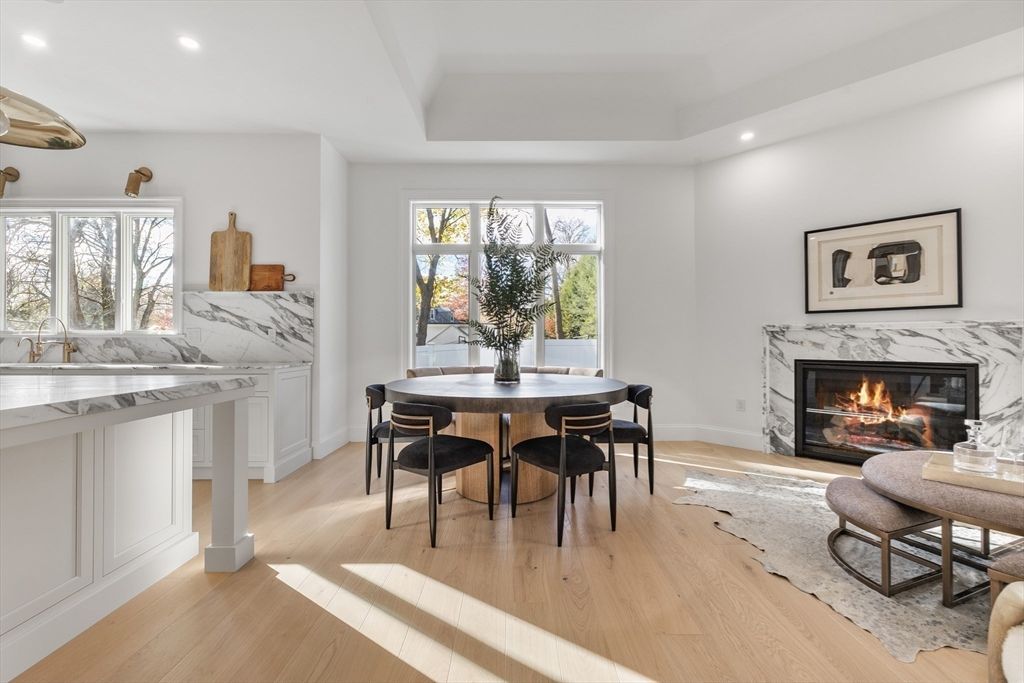 Dining room, Fireplace, Interior, Marble Walls, Recessed Lighting, Wood Texture Flooring