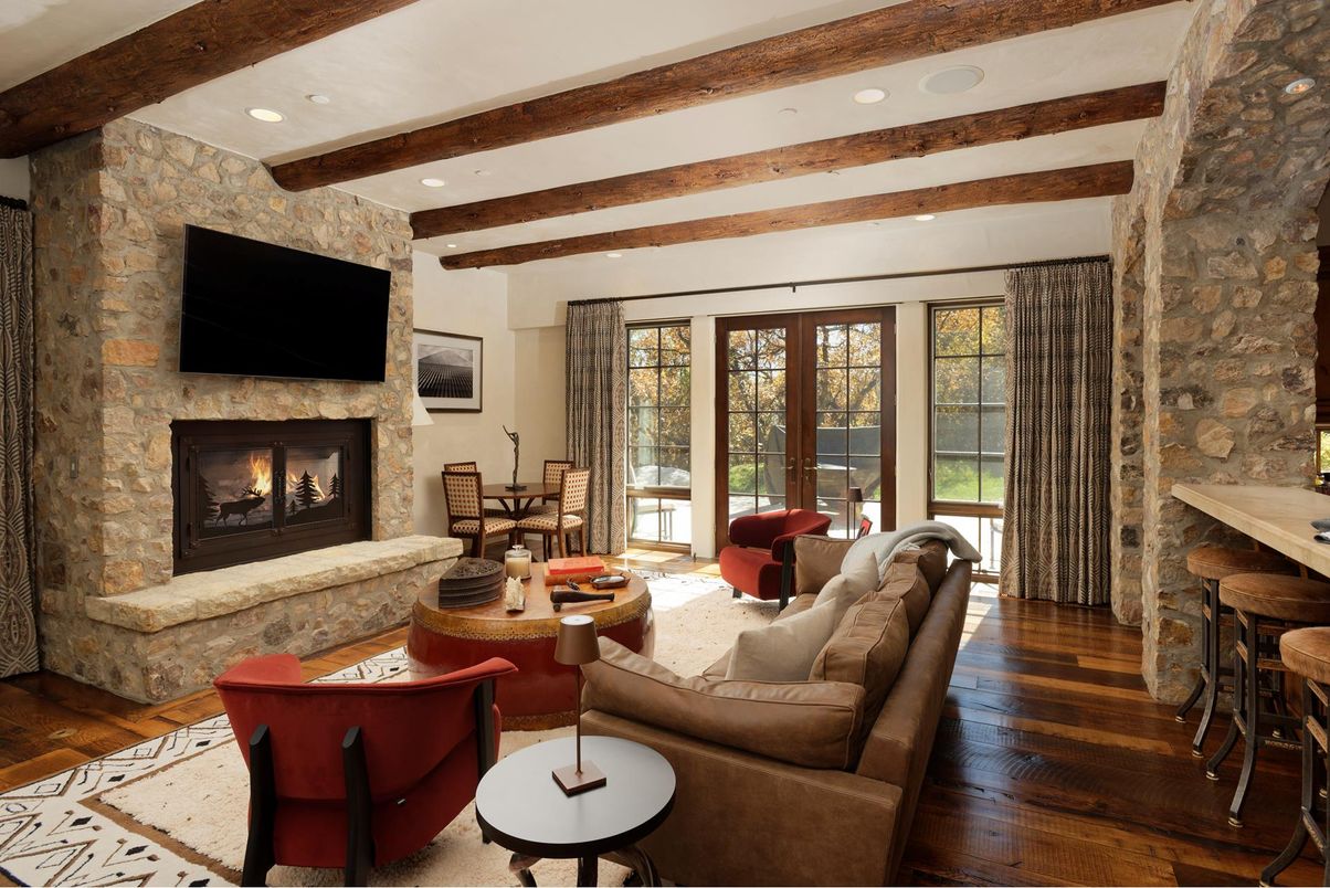 Fireplace, Interior, Living room, Recessed Lighting, Stone Walls, Wooden Beams, Wood Texture Flooring