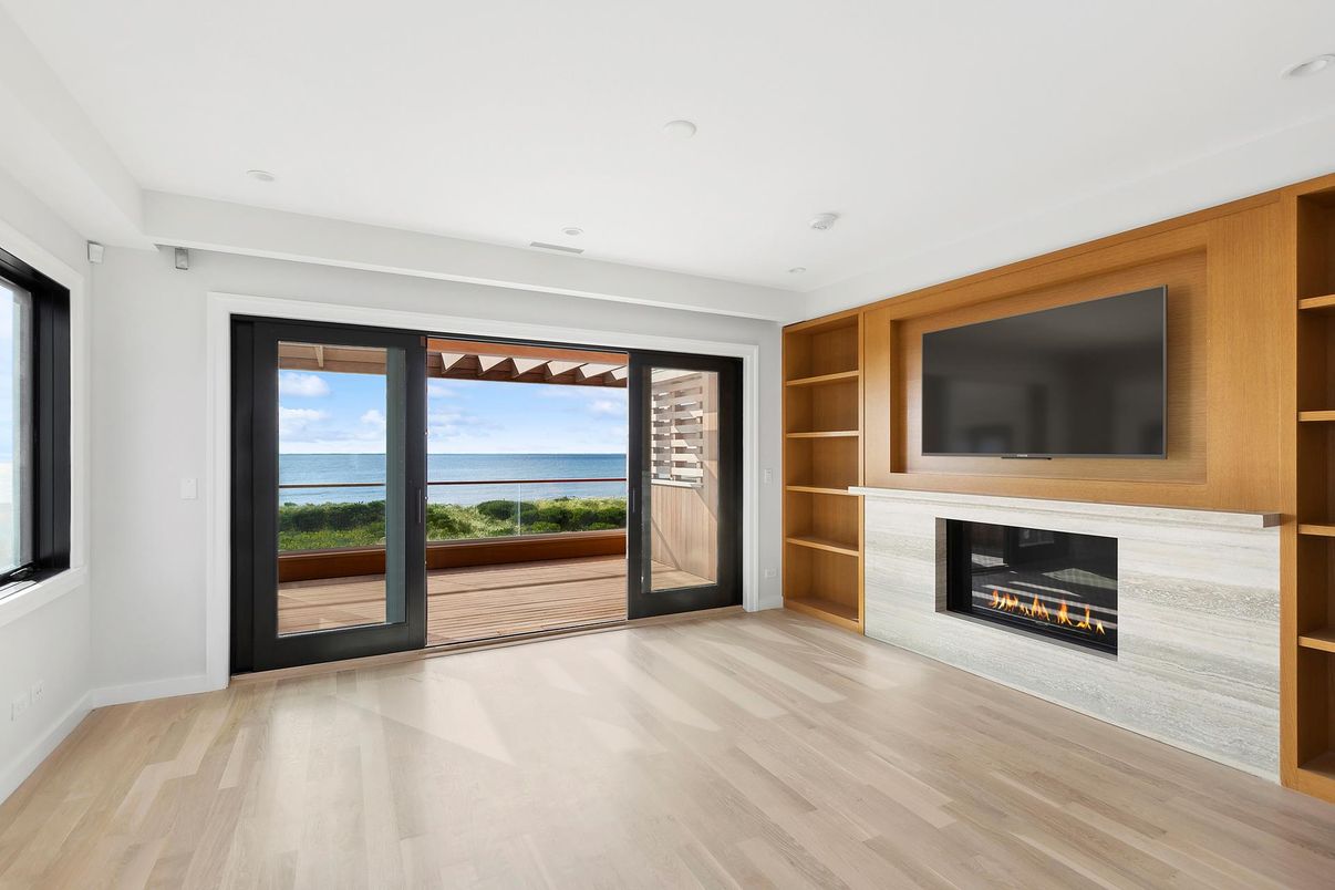 Empty room, Fireplace, Interior, Recessed Lighting, Water, Wood Texture Flooring