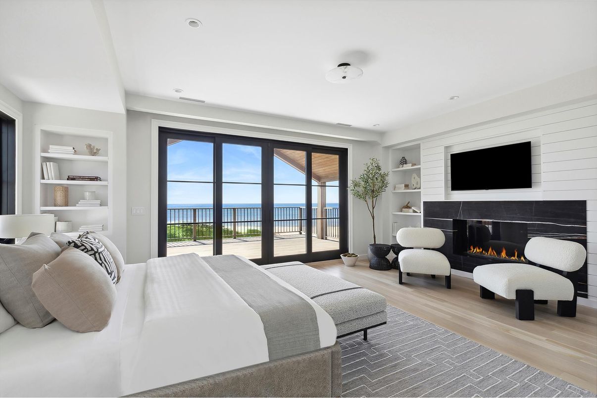 Bedroom, Fireplace, Interior, Recessed Lighting, Water, Wood Texture Flooring