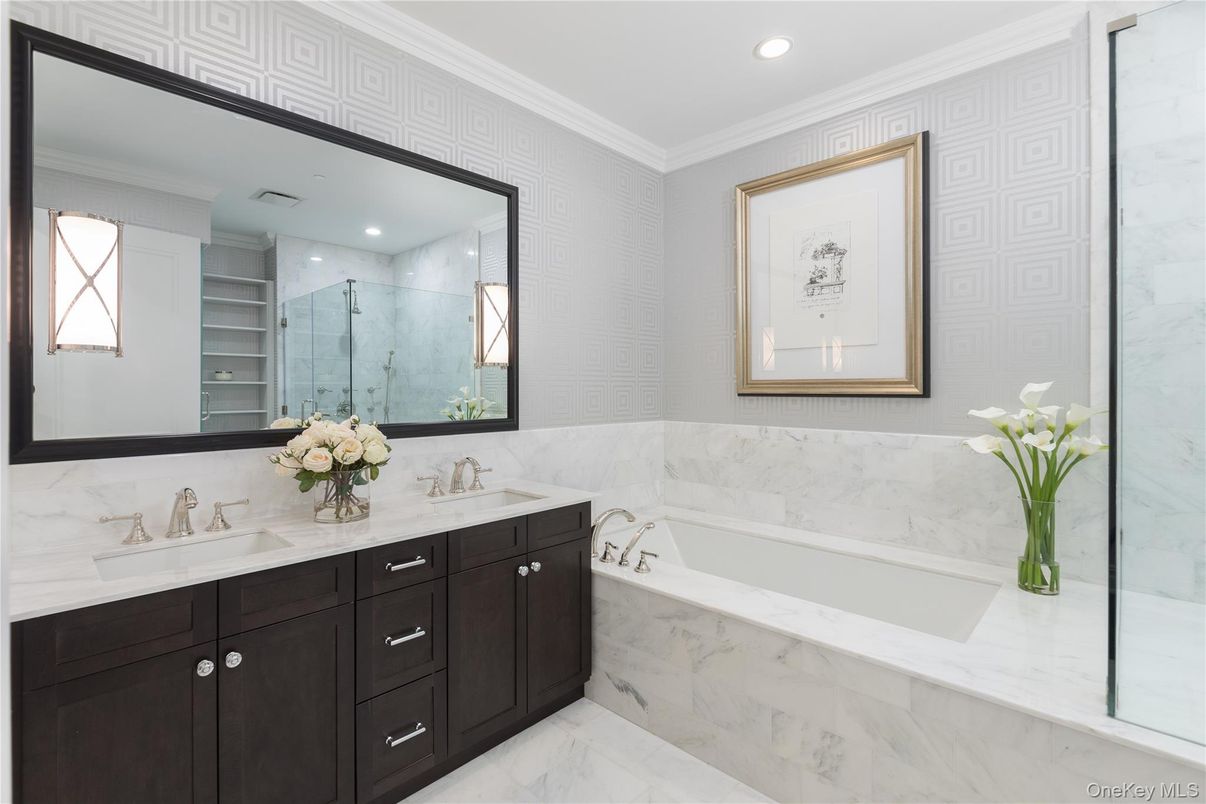 Bathroom, Dual Sink Vanities, Glass Shower, Interior, Marble, Marble Walls, Recessed Lighting